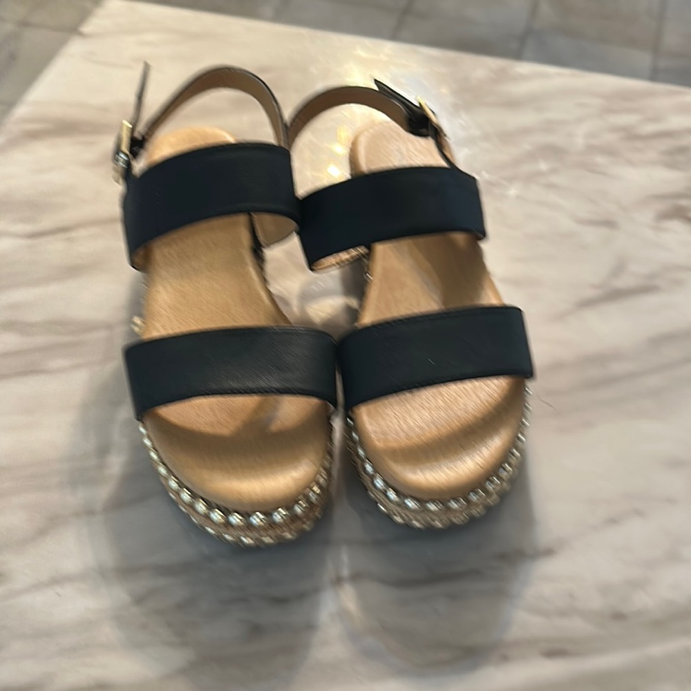 Used woman’s size 7 black sandals